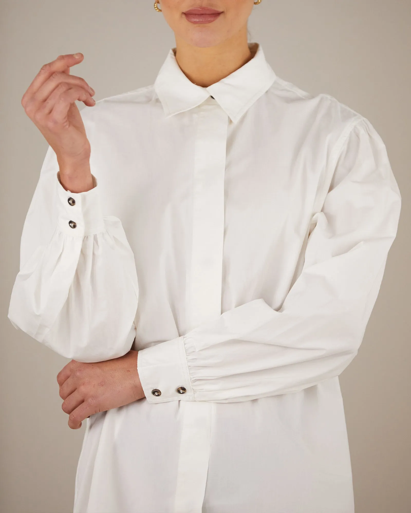 Sure! The optimized title for this e-commerce product could be Stylish Blythe Shirt Dress.